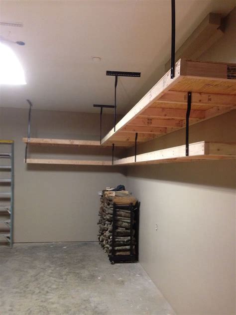 diy garage shelves with metal brackets and plywood|putting up shelves in garage.